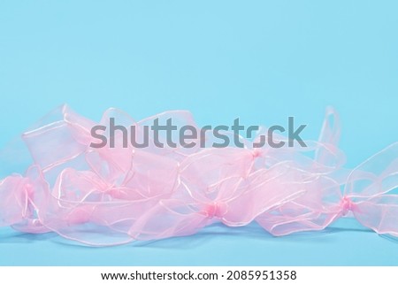Pink bows on a blue background