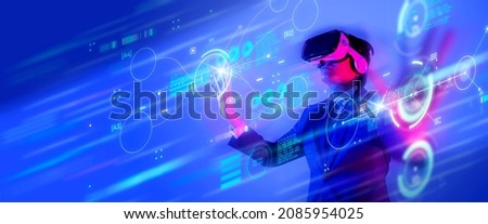 Metaverse digital cyber world technology, man with virtual reality VR goggle playing AR augmented reality game entertainment and business meeting conference, futuristic lifestyle Royalty-Free Stock Photo #2085954025
