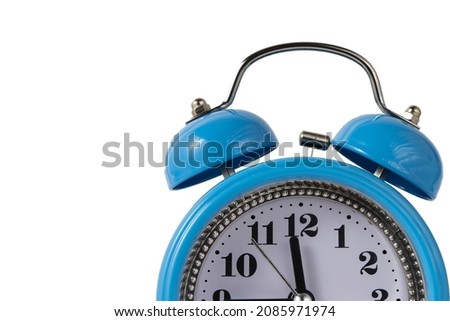 Alarm clock over white. Time concept. Blue alarm clock morning time. Blue alarm clock with copy space on a white background.