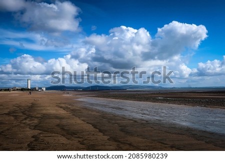 Scenic view of sandy beach near Swansea by low tide, Wales