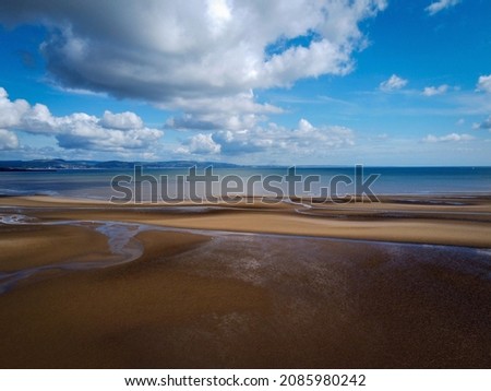 Scenic view of sandy beach near Swansea by low tide, Wales
