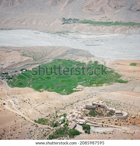 Aerial view of Buddhist temple monastery Key (Ki Gompa) on a high cliff overlooking the confluence of Pin Rivers and Spiti Valley at Indian Himalayas, Himachal Pradesh, India. Landscape photography