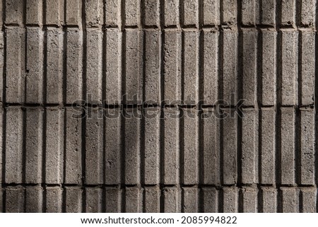 Texture of old uneven rectangular square street asphalt floor wall tile