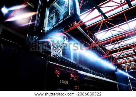 Basketball theme with basket, scoreboard and sport hall lights Royalty-Free Stock Photo #2086030522