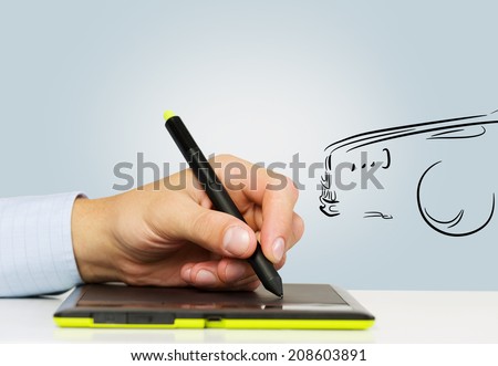 Close up of man hands working on tablet