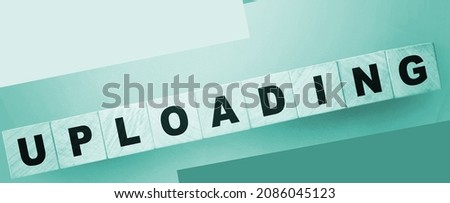 uploading word on wooden cubes. Internet resources concept