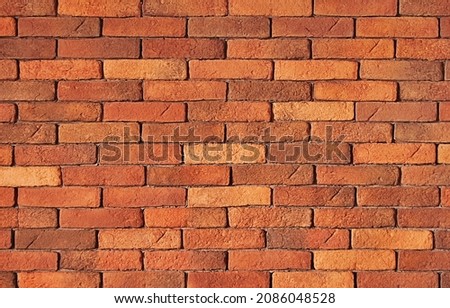 A red brick wall texture as background
