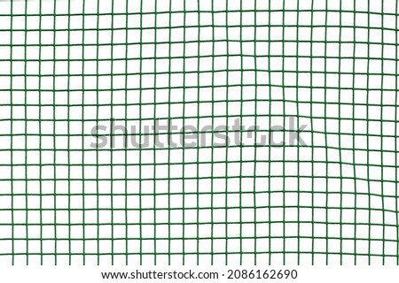 green net on white background. It can be part of soccer, volleyball, tennis, fishing networks. High resolution texture Royalty-Free Stock Photo #2086162690