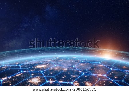 Communication network above Earth for global business and finance digital exchange. Internet of things (IoT), blockchain, smart connected cities, futuristic technology concept. Satellite view. Royalty-Free Stock Photo #2086166971