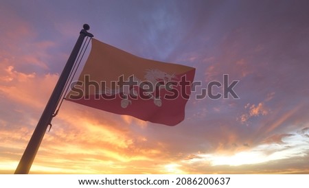 Bhutan Flag on a Pole with Sunset Sky Evening Background Bhutanese