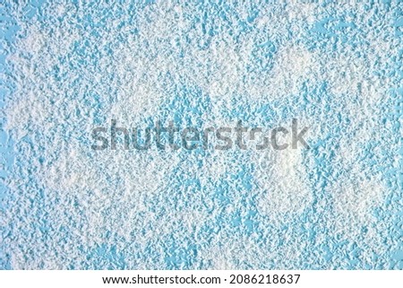 White snow on a blue background