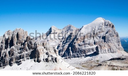 panorama towards the Tofana di Rozes in summer seen from Rifugio Lagazuoi on the dolomites of cortina d'ampezzo during a summer vacation in the italian alps Royalty-Free Stock Photo #2086221820