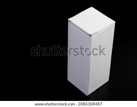 blank packaging white cardboard box for product design mock-up isolated on black background