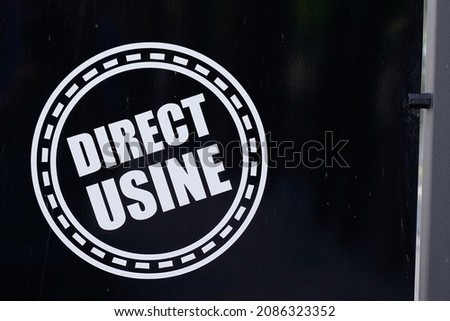 direct usine french text means factory direct logo on flag board at the entrance of a store