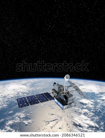 Cargo space craft 3D illustration Earth planet.Dark background. Sci-fi wallpaper.Space Station Orbiting Earth.Space ship. Space art wallpaper.Solar Observatory.Elements of this image furnished by NASA