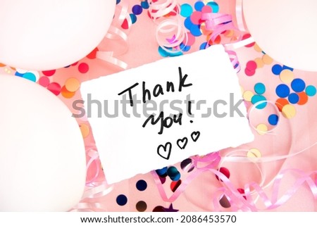 Thank you card on pink background with air balloons, confetti decorations, beautiful thankfulness concept