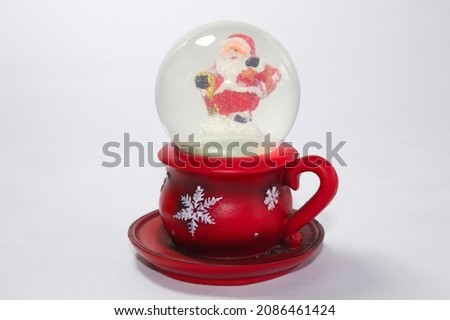 Santa Claus inside a glass globe