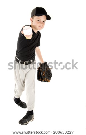 Young baseball player throwing ball at camera
