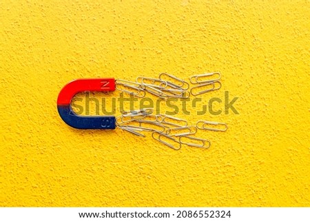 Magnet with paper clips. Office supplies top view