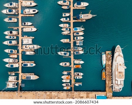 Aerial photography. the black sea of Russia, the city of Sochi, a seaport, yachts and ships at the pier. beautiful city