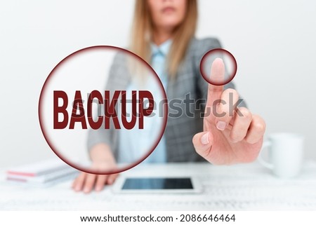 Text caption presenting Backup. Conceptual photo copy of file or other item data made in case original is lost damaged Displaying New Smartphone Technology, Discussing Device Improvements