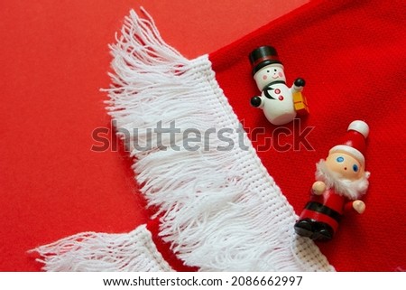 flat lay of Chistmas ornaments decoration on red background