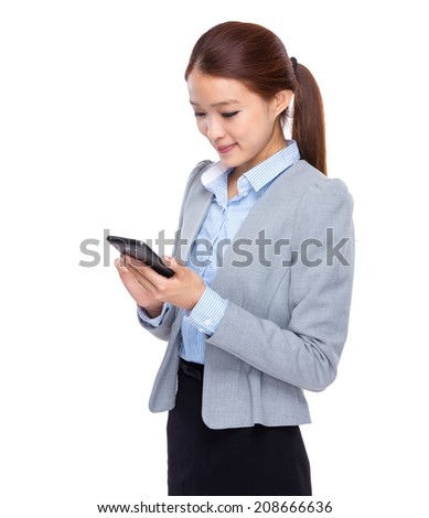 Young businesswoman look at cellphone