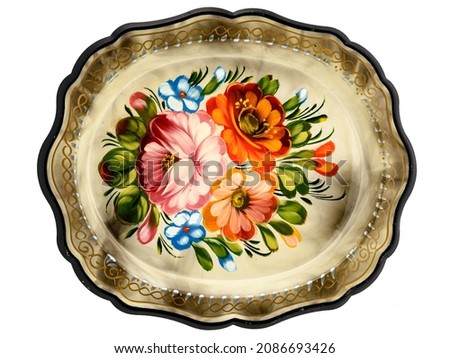 Old decorative russian folk handpainted metal tray with floral color pattern on white. Use for interior design. Royalty-Free Stock Photo #2086693426