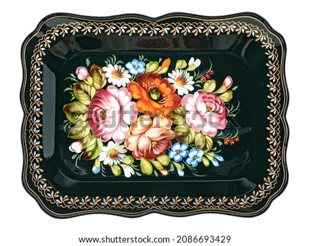 Old decorative russian folk handpainted metal tray with floral color pattern on white. Use for interior design. Royalty-Free Stock Photo #2086693429