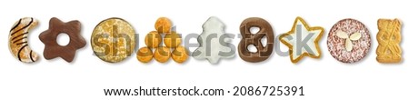 Various German Christmas sweets and cookies against white background