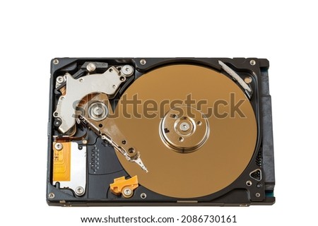 Macro view of disassembled hard drive isolated on white background. 