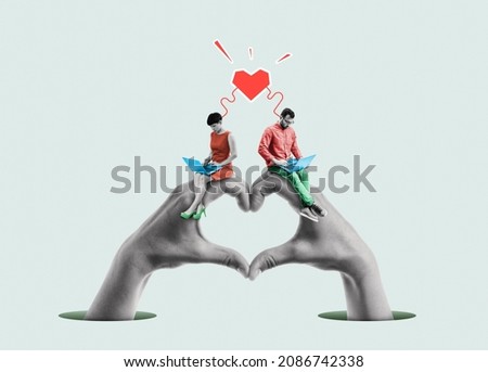 Concept for online dating or love correspondence. A man and a woman meet and communicate on the Internet.  Royalty-Free Stock Photo #2086742338