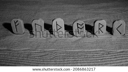 Anglo Saxon Old English runic letters spell FUTHORK, a version of an ancient Germanic alphabet Royalty-Free Stock Photo #2086863217
