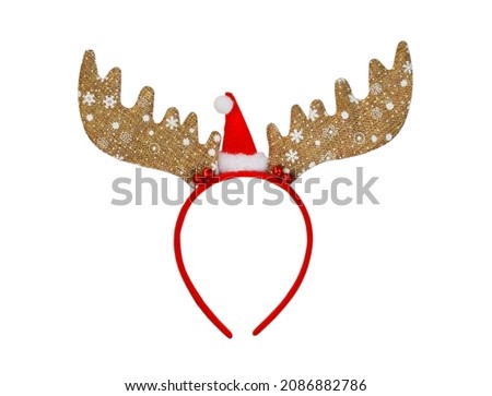 a funny Christmas rim on the head in the form of deer antlers for celebrating a new year or a party is decorated on a white background.