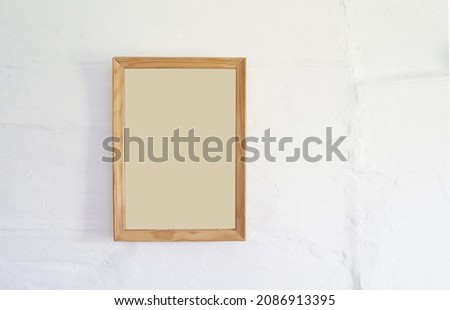 blank picture frame on the wall