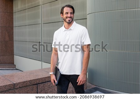 White polo shirt street style menswear fashion apparel shoot Royalty-Free Stock Photo #2086938697