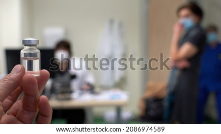 Europe, Italy, Milan December 2021 - Vaccination against covid-19 Coronavirus epidemic with generic vaccine dose no logo , Omicron variant Royalty-Free Stock Photo #2086974589