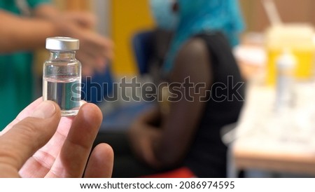 Europe, Italy, Milan December 2021 - Vaccination against covid-19 Coronavirus epidemic with generic vaccine dose no logo , Omicron variant Royalty-Free Stock Photo #2086974595