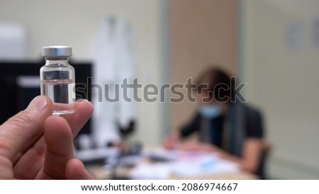 Europe, Italy, Milan December 2021 - Vaccination against covid-19 Coronavirus epidemic with generic vaccine dose no logo , Omicron variant Royalty-Free Stock Photo #2086974667