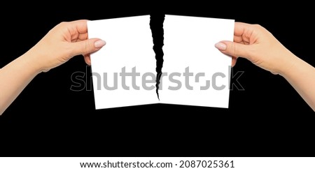 Mock up with woman hands are tearing paper in two parts