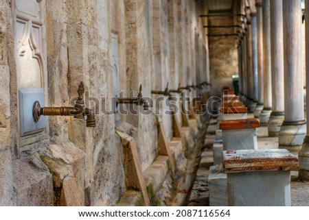 The place where ablution is made in the courtyard of the mosque and the faucets that look nice Royalty-Free Stock Photo #2087116564