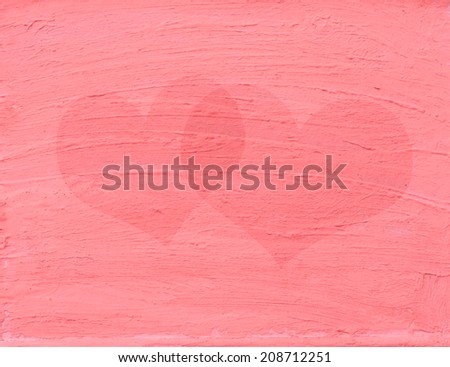 Heart shapes on painted pink wall