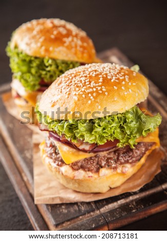 Delicious hamburgers served on black stone