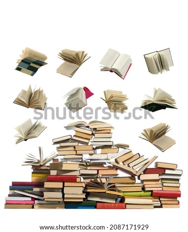 Books falling on a large pile of books on a white background.