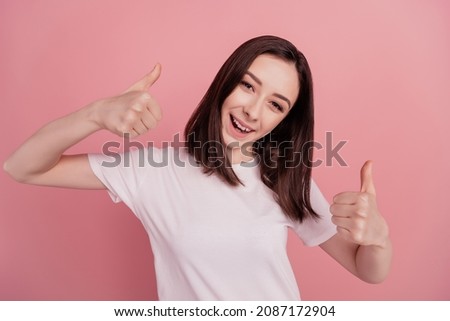 Photo of excited funny lady raise thumb up approve choice isolated pink color background