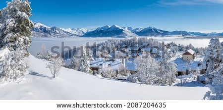 Laye winter ski resort covered in fresh snow with panoramic view of the mountains of Ecrins National Park. Champsaur valley in the French Alps. Hautes-Alpes, France Royalty-Free Stock Photo #2087204635