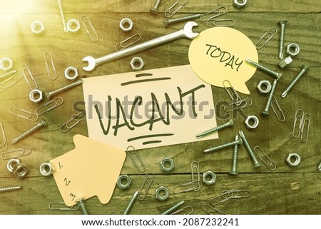 Text caption presenting Vacant. Business concept lacking contents which could or should be present Empty Not filled New Ideas Brainstoming Maintenance Planning Creative Thinking Paper Clip