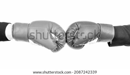 Challenge to fight. Red boxing glove against blue glove. Business competition Royalty-Free Stock Photo #2087242339