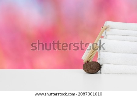 Spa still life with stacked stones and towels