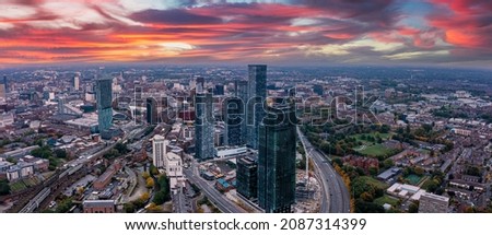 Aerial view of Manchester city in UK on a beautiful sunny day. Royalty-Free Stock Photo #2087314399